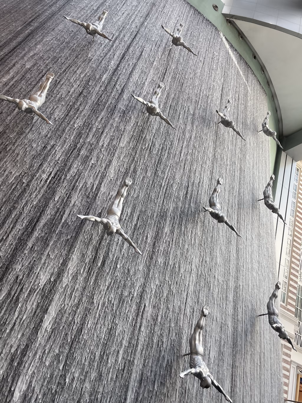 The dramatic Diver Statues at The Dubai Mall are a must-see masterpiece for any family visit.