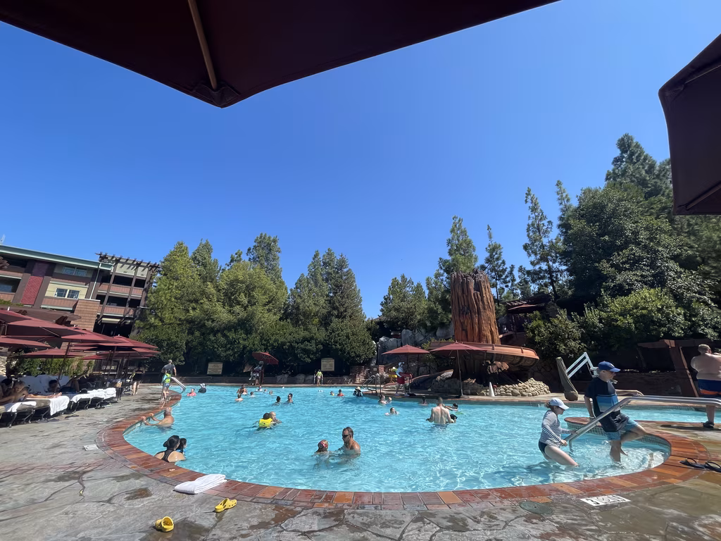 The Redwood Pool at Disney’s Grand Californian offers a relaxing oasis with its signature waterslide.