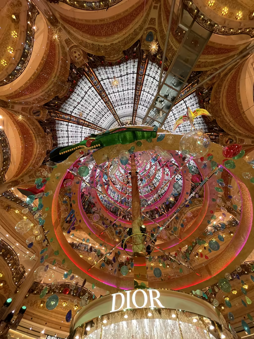 The breathtaking holiday display at Galeries Lafayette turns shopping into a magical winter wonderland experience.