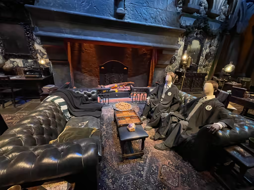 Step inside the cozy Slytherin common room, perfectly recreated for fans to explore at Warner Bros. Studios.