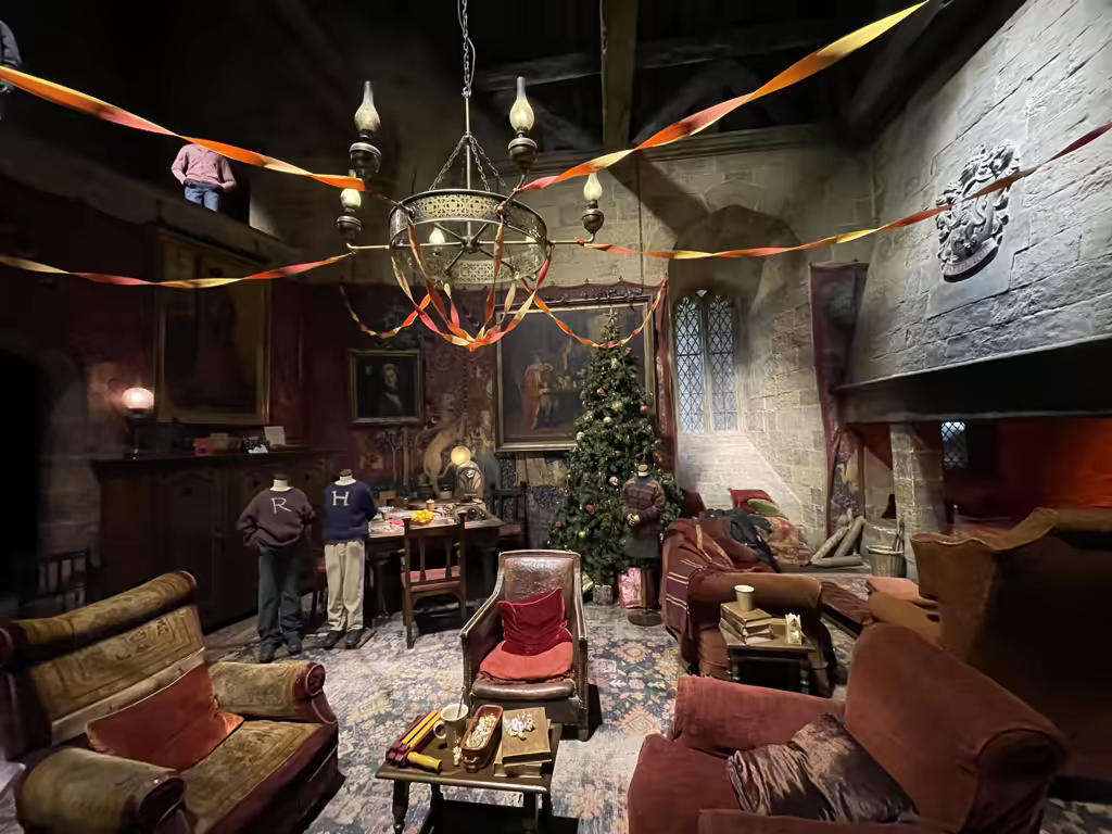 Step inside the iconic Gryffindor common room, perfectly decorated for the holidays at Warner Bros. Studio Tour.