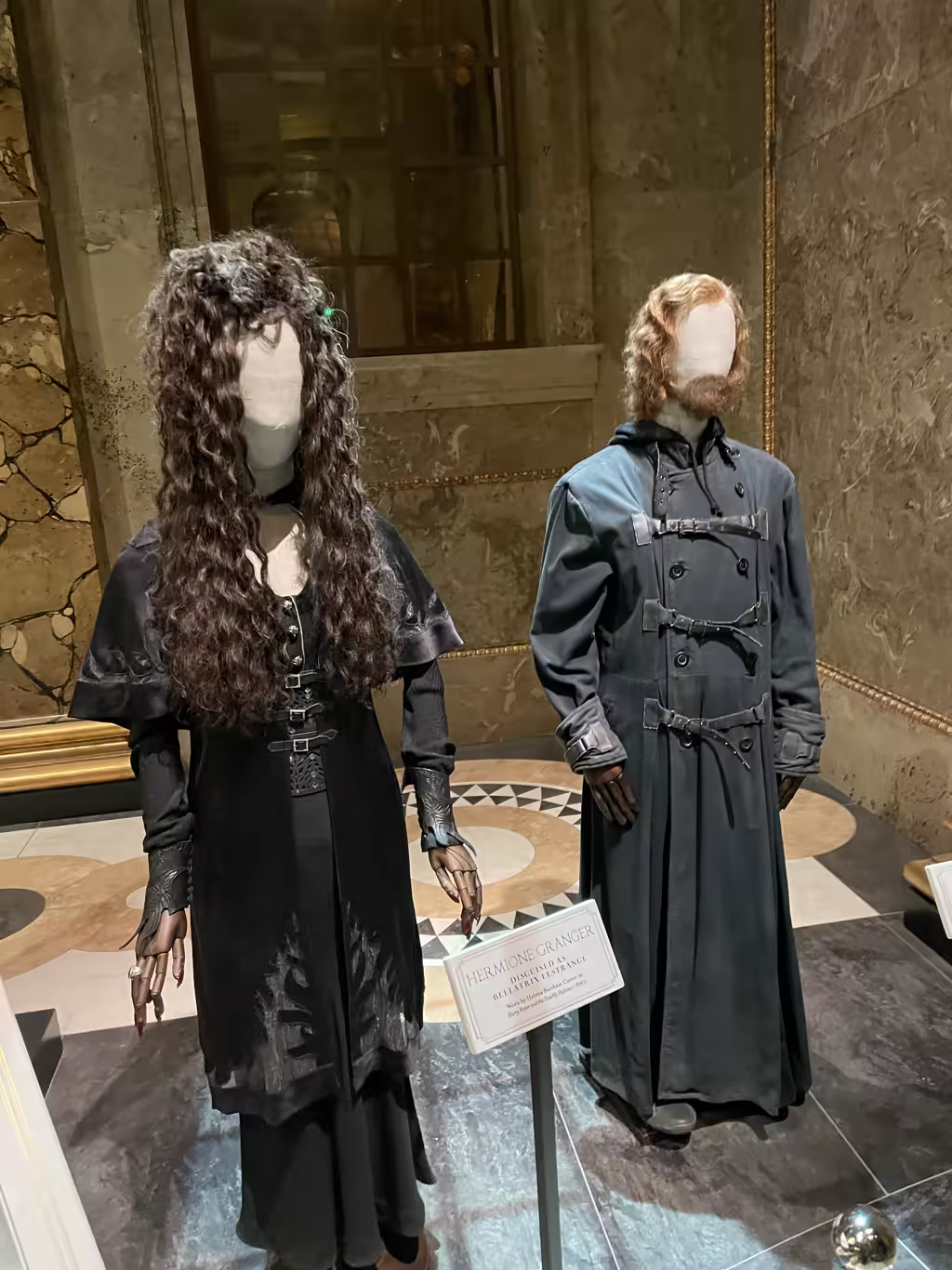 Get up close to the iconic movie costumes worn by characters during their Gringotts Bank heist.