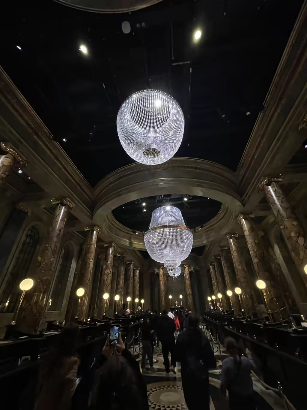 Step inside the awe-inspiring Gringotts Wizarding Bank, complete with its grand marble pillars and chandeliers.