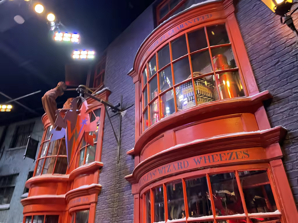 Step inside the iconic Weasleys' Wizard Wheezes shop, a highlight for children visiting the Warner Bros. Studios.