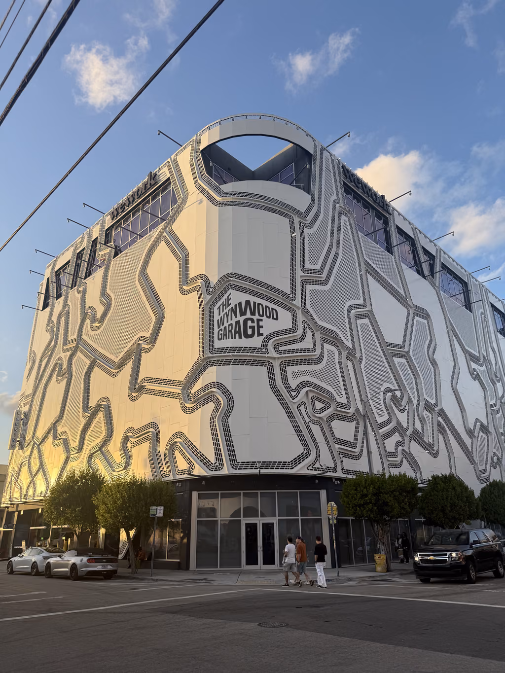 The distinctive geometric architecture of The Wynwood Garage stands out perfectly in Miami’s vibrant art district.