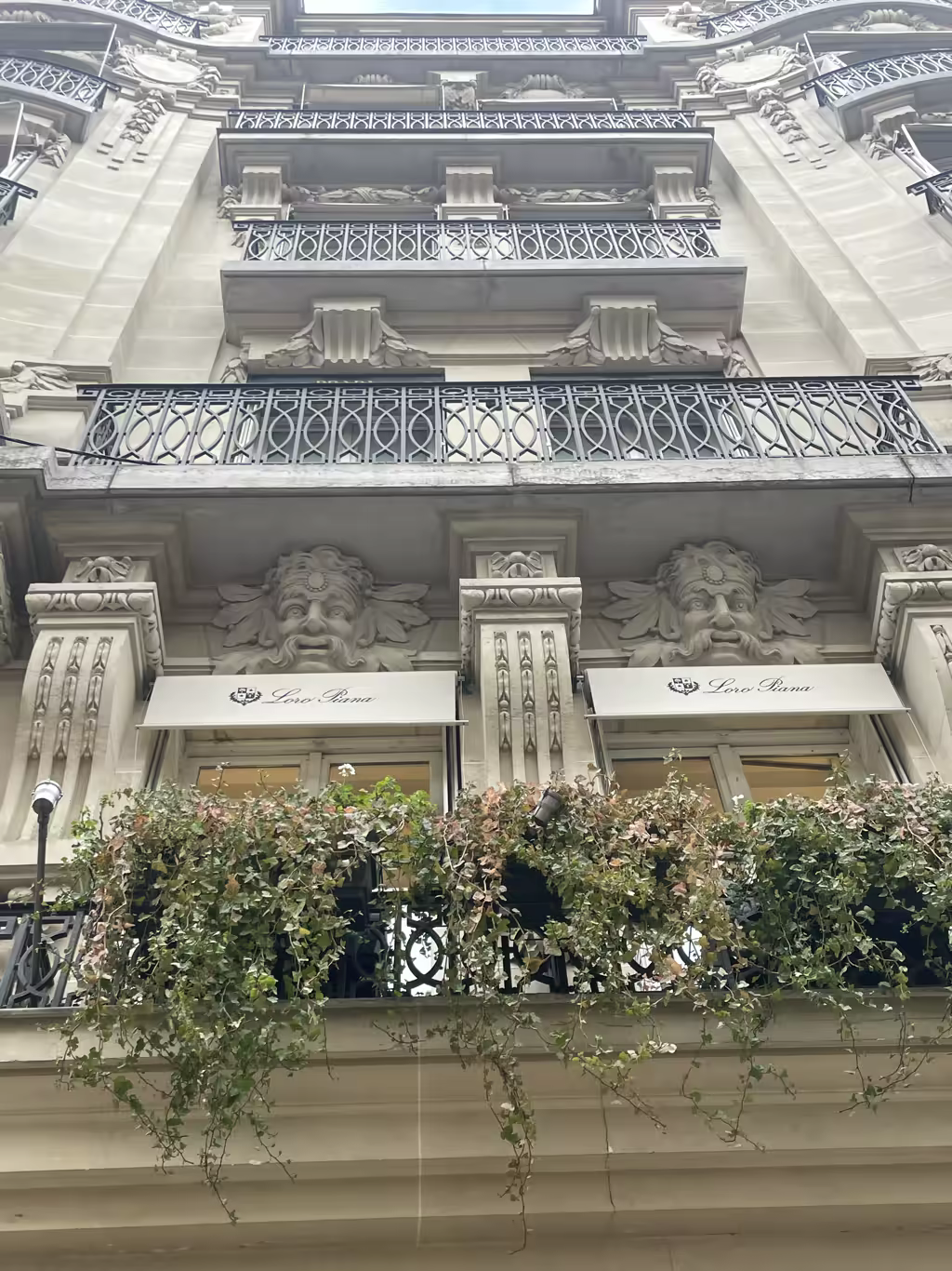 The ornate architecture of the Loro Piana boutique adds a touch of Parisian elegance to our walk.
