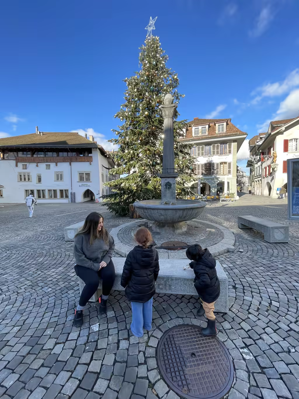 Stroll down the charming, cobblestone streets of Spiez's old town decorated for the festive holiday season.
