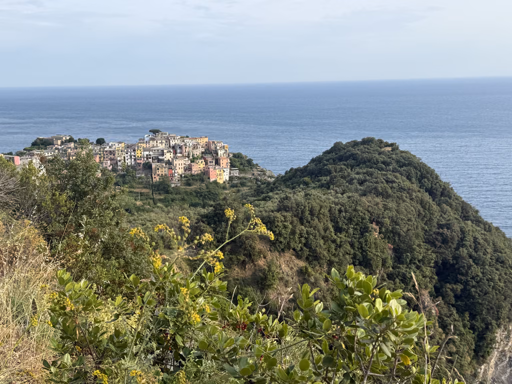 Corniglia village perched on a cliffside overlooking the Mediterranean Sea in Cinque Terre, Italy.