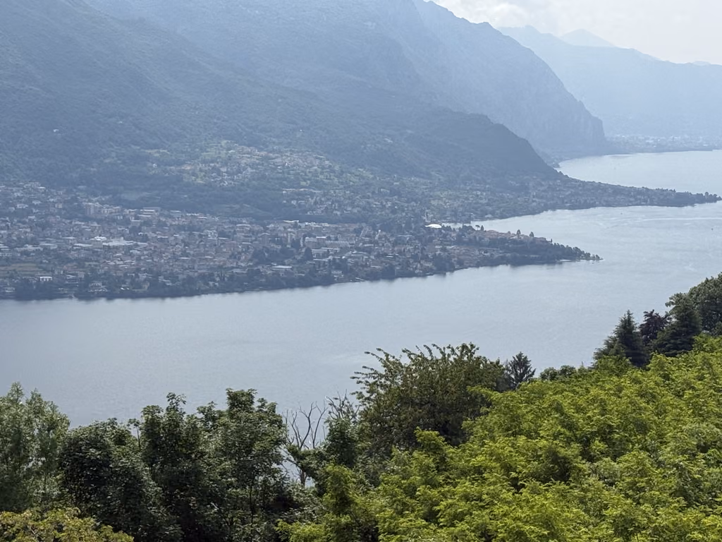 Aerial view of Lake Como and its surrounding mountainside towns, Italy.