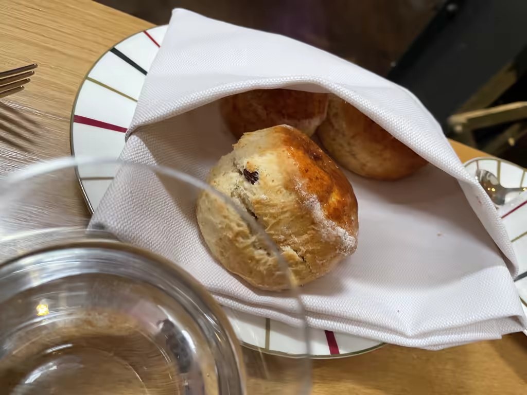 Indulge in a quintessential British afternoon tea experience while relaxing between London Christmas market visits.