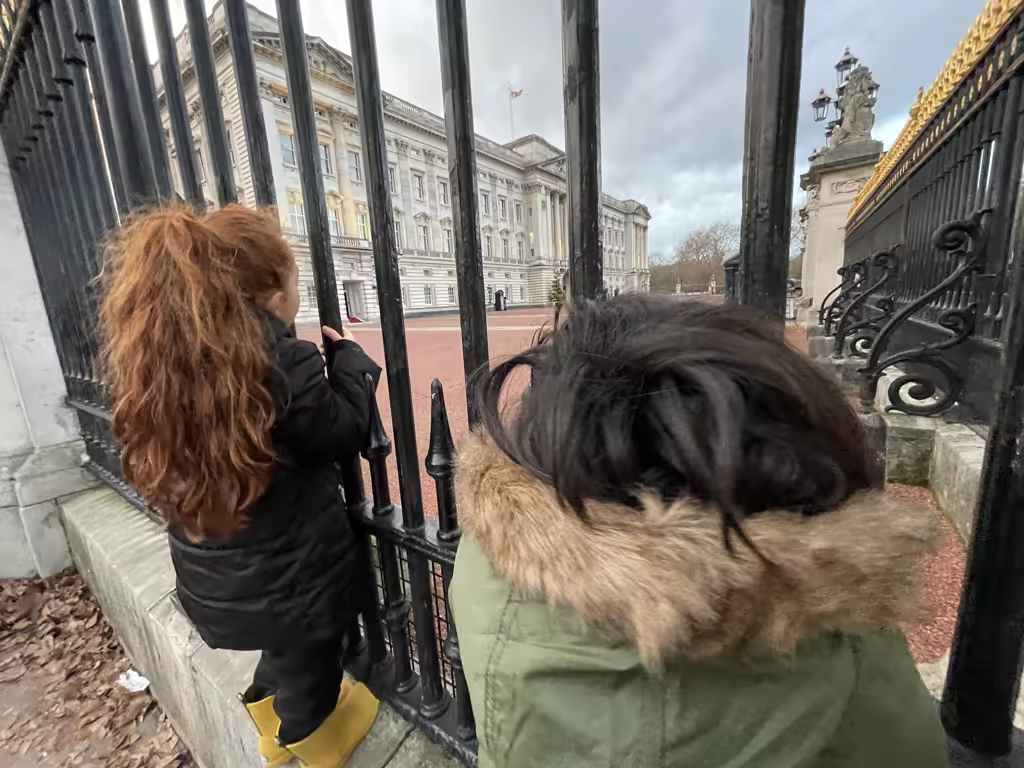 Watching the Changing of the Guard at Buckingham Palace is a magical Christmas tradition for kids.