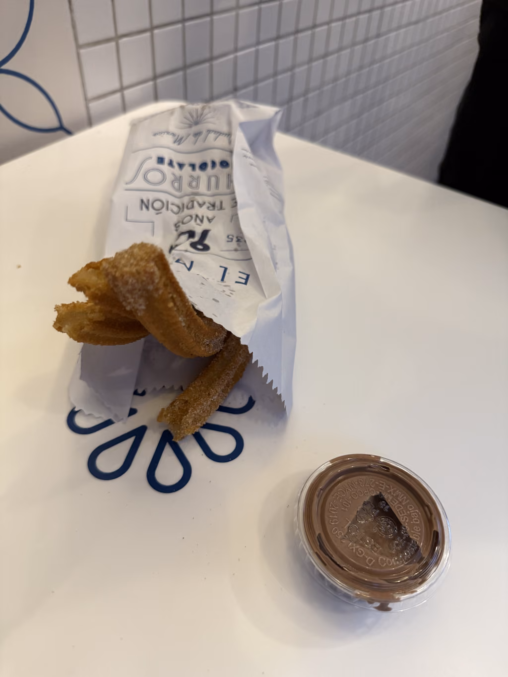 Fuel up on crispy, cinnamon-dusted churros at El Moro for the ultimate Mexico City street food experience.