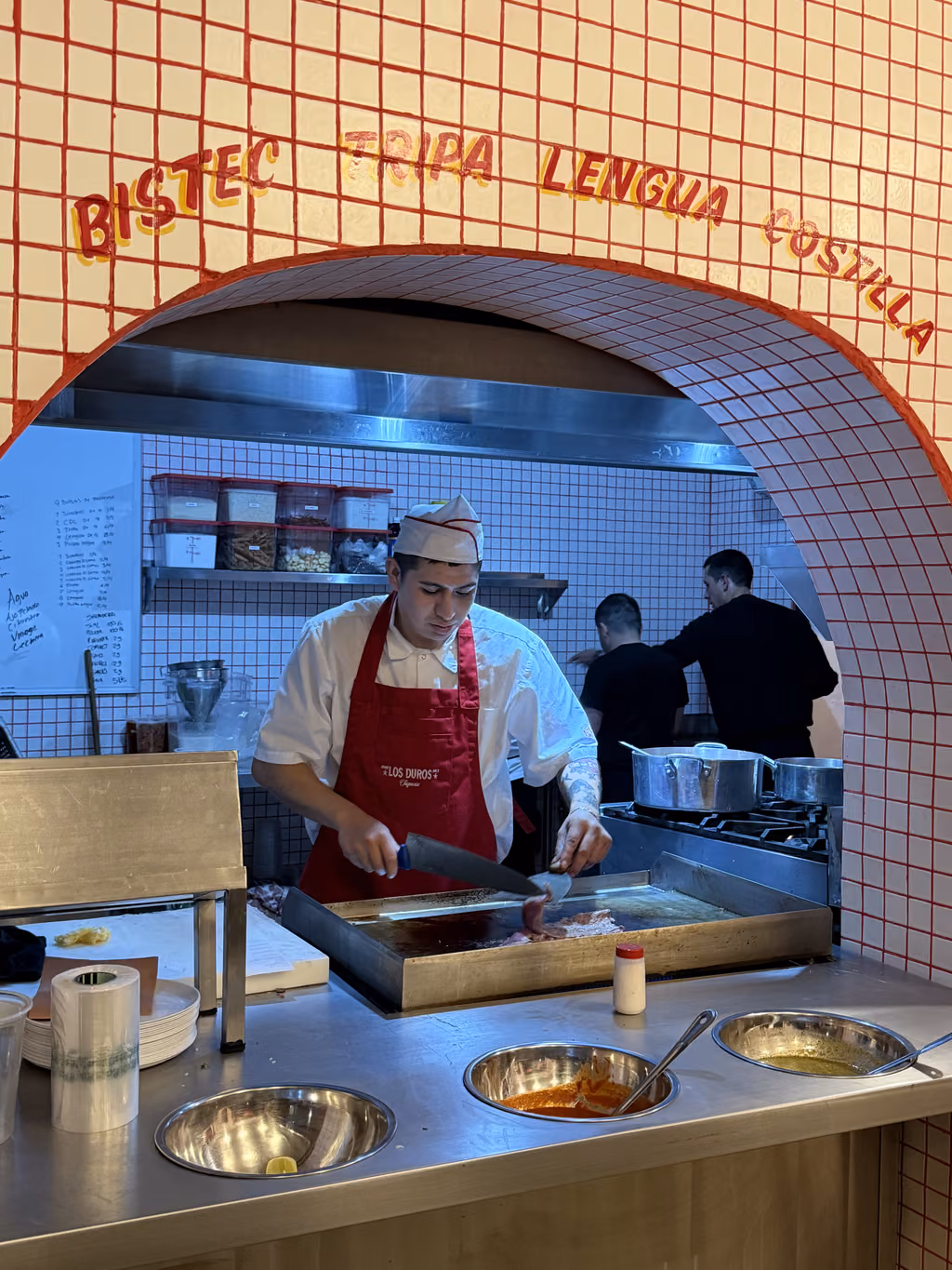 Watch the pros at work as they expertly sear fresh meats for authentic Mexico City tacos.