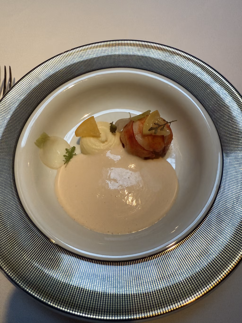 Savoring a perfectly prepared lobster course at The French Laundry, a highlight of our birthday celebration.