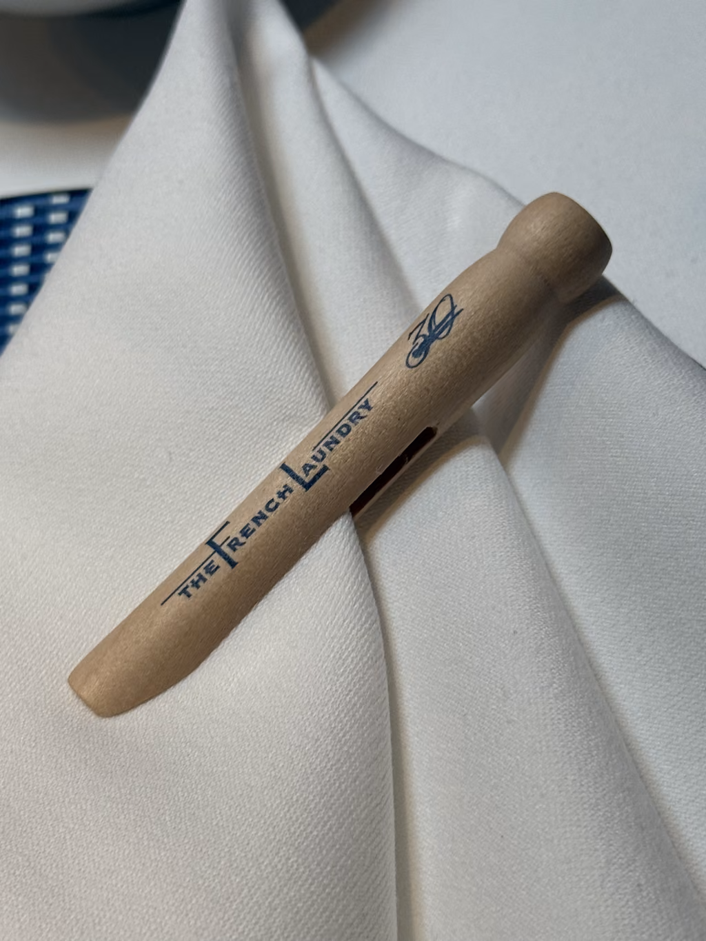 The iconic clothespin napkin holder marks the start of our exquisite birthday meal at The French Laundry.