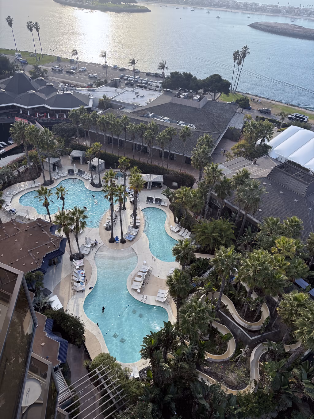 Aerial view of the sprawling swimming pool complex at Paradise Point Resort overlooking Mission Bay in San Diego.