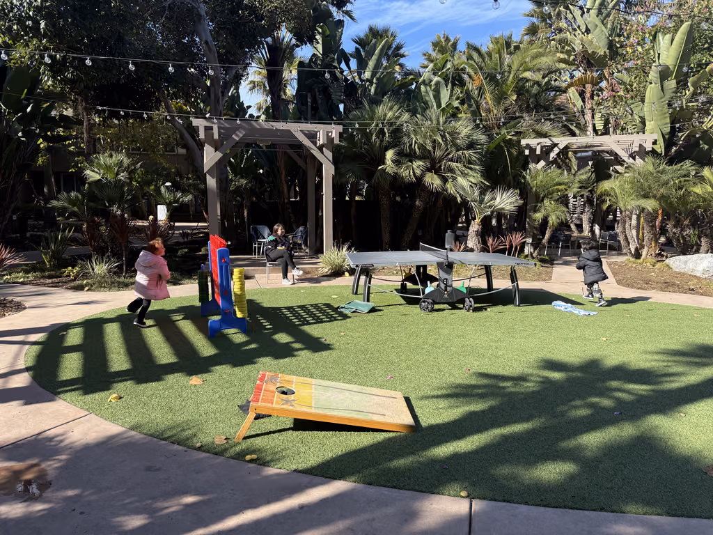 Enjoy some relaxing downtime at the hotel’s outdoor courtyard, featuring fun yard games for the kids.