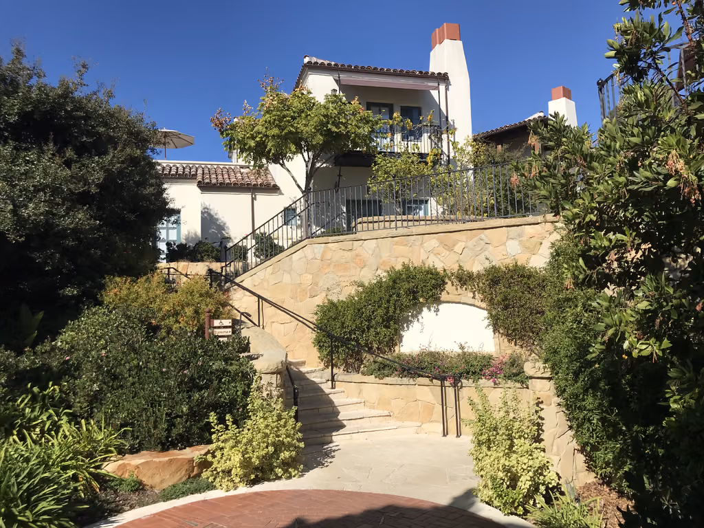 Wander through the lush, Mediterranean-inspired pathways of this Santa Barbara retreat on your next family getaway.