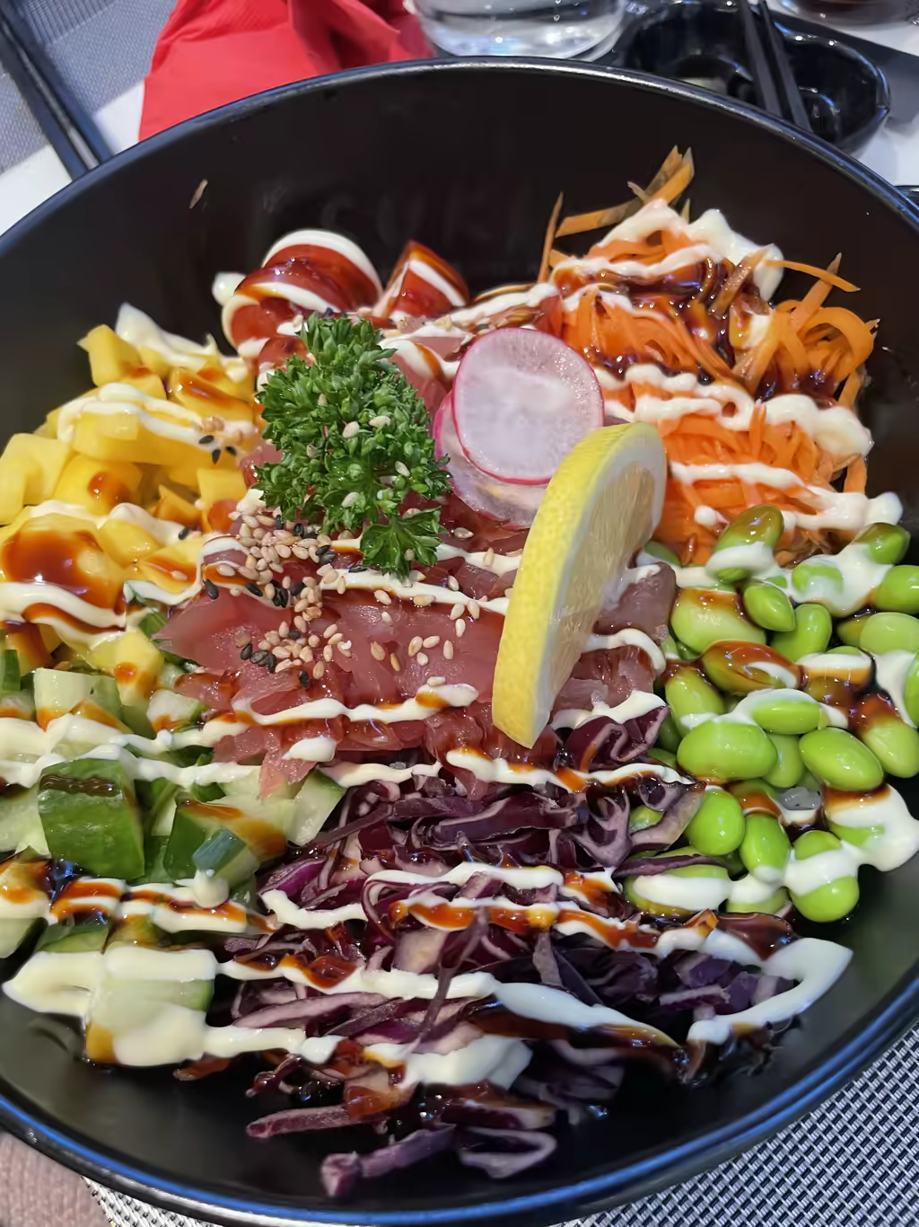 Enjoy a fresh, colorful poke bowl as a refreshing meal between Alsace Christmas market visits.