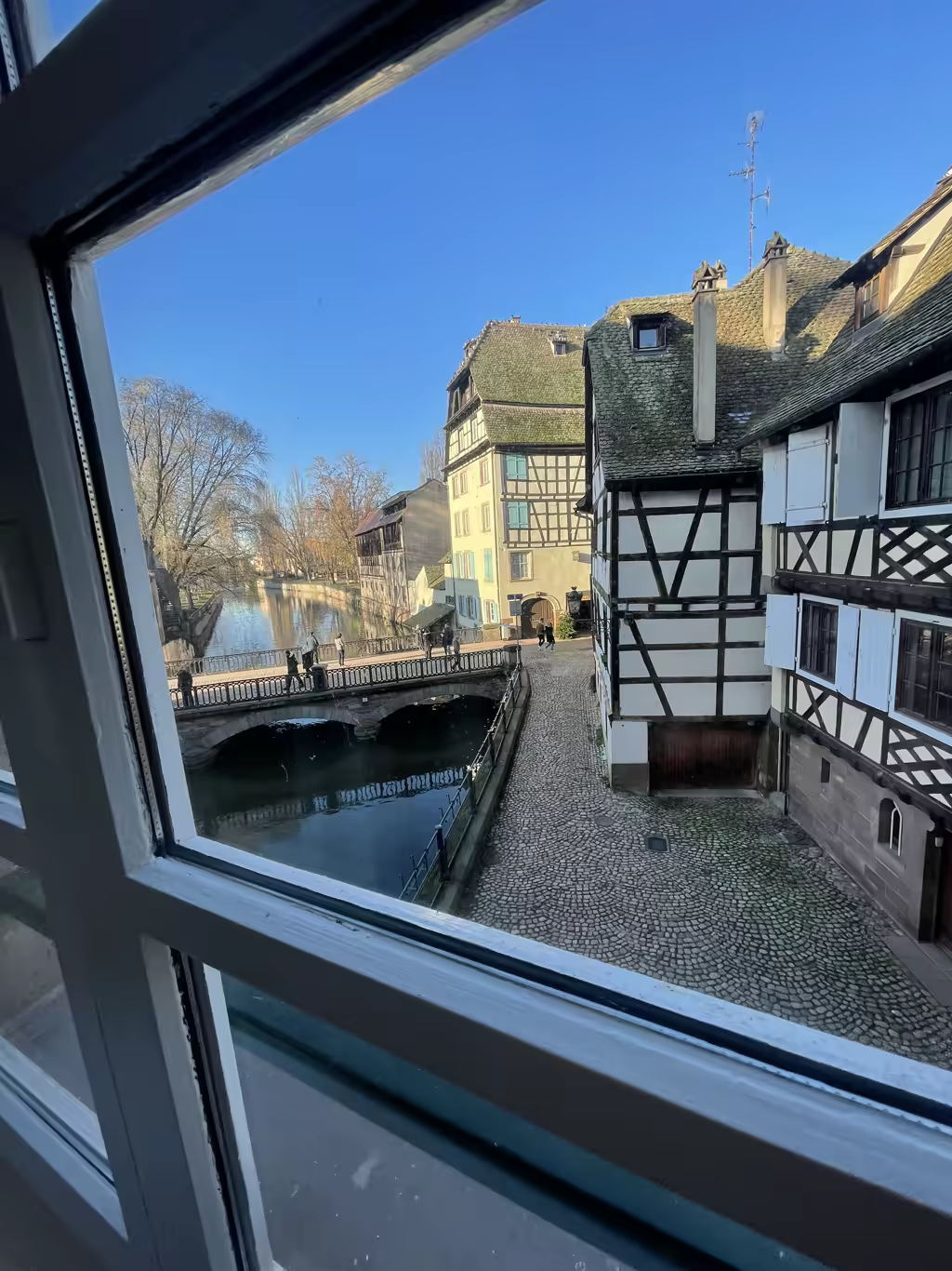 Enjoy the timeless charm of La Petite France with this stunning canal-side view from our hotel.